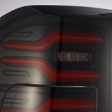 AlphaRex 19-21 Dodge Ram 1500 Luxx-Series LED Tail Lights Black/Red with Activ Light/Sequential Signal