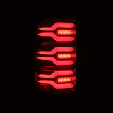 AlphaRex 19-21 Dodge Ram 1500 Luxx-Series LED Tail Lights Black/Red with Activ Light/Sequential Signal