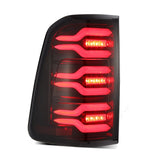 AlphaRex 19-21 Dodge Ram 1500 Luxx-Series LED Tail Lights Black/Red with Activ Light/Sequential Signal